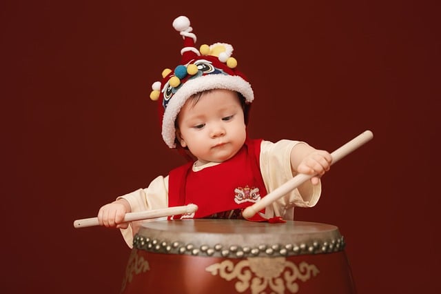 tet, baby, drum, traditional costume, chinese theme, asian child, red, cotton hat, kids, happiness, celebration, pom-pom, toddler, festival, numeric pattern, asian art, tower, culture, young, central